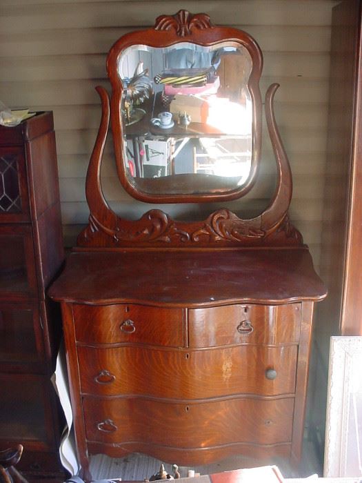 Beautiful oak bow front dresser. $295