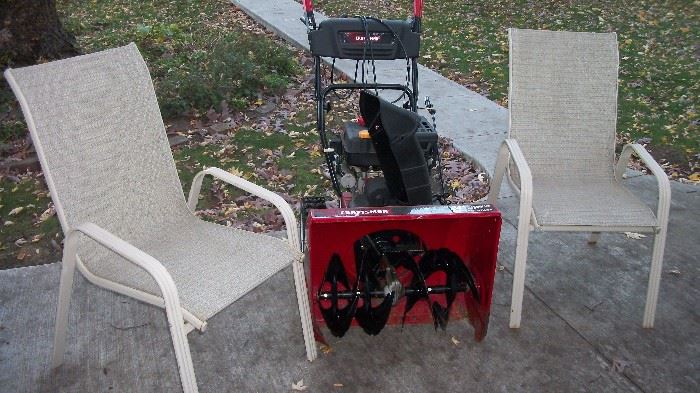 lawn chairs and snowblower