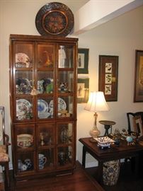 Great Asian style lighted beveled glass display cabinet. 