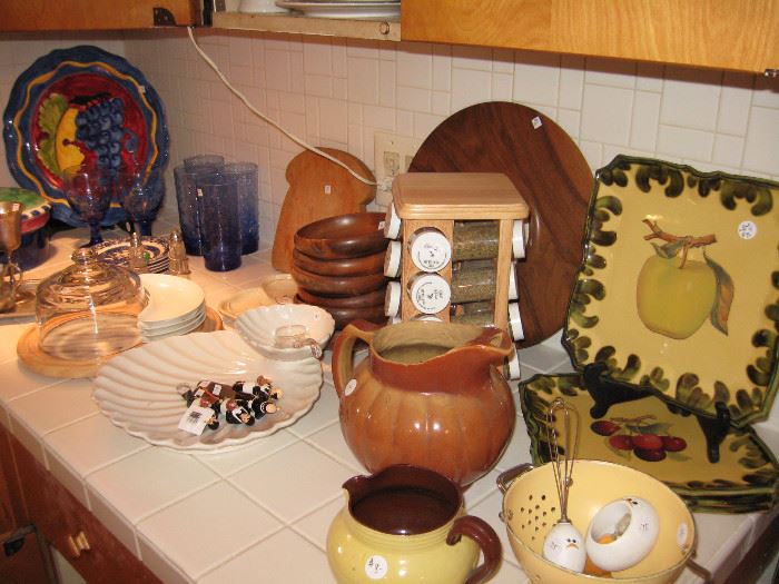 Cutting boards, Italian pottery, depression era pottery and glassware. 