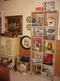 Painted wine cabinet , lots of party platters and dishes 