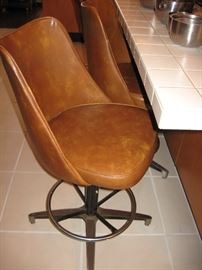 Two pairs of swivel bar stools. (Each pair different )
