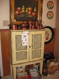Painted wine cabinet. Some fun kitchen copper 