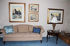 Artwork by Barbara Baker,  Lalique piece on round table. 