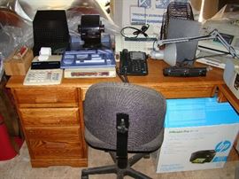 oak desk, phones, fax, typewriter, lamp etc.