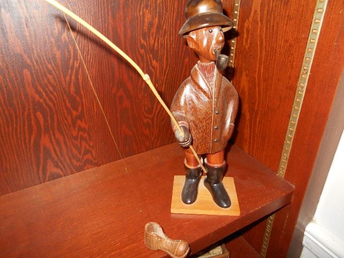 Whimsical wooden fisherman. This is my fishing luck... bringing an old shoe! 