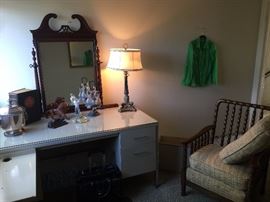 Steelcase desk with glass protective top. Older well crafted chair with intricate spindles. Beautiful Mahogany framed mirror can sit on dresser or hang on wall.