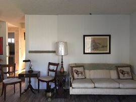 Nice comfotable Couch, End tables, Matching chairs. Unique Lamp.