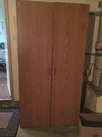 Storage cabinet with built in shelving.