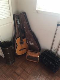 Estaban acoustic guitar and amp. Unique umbrella holder; rolling office case.