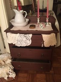 Cute small chest of drawers.