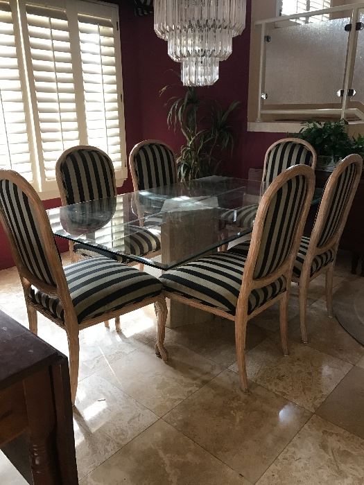 Lovely dining room set: Heavy beveled glass top and six custom upholstered chairs