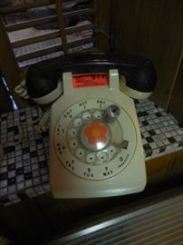 Rotary Dial Phone..Except..these have Locks on them.We have the keys!! Remember when the timer was on for long distance phone calls..? 
