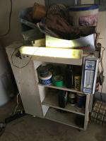 work cabinet with light and contents