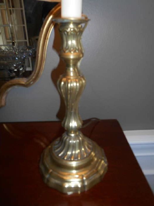 Dining Room:  A closer photo of one of the pair of 18th century Rococo French gilded candlesticks fitted into a pair of lamps.  Each has a custom silk shade.  Pair was  purchased at JULES PASS in Clayton.
