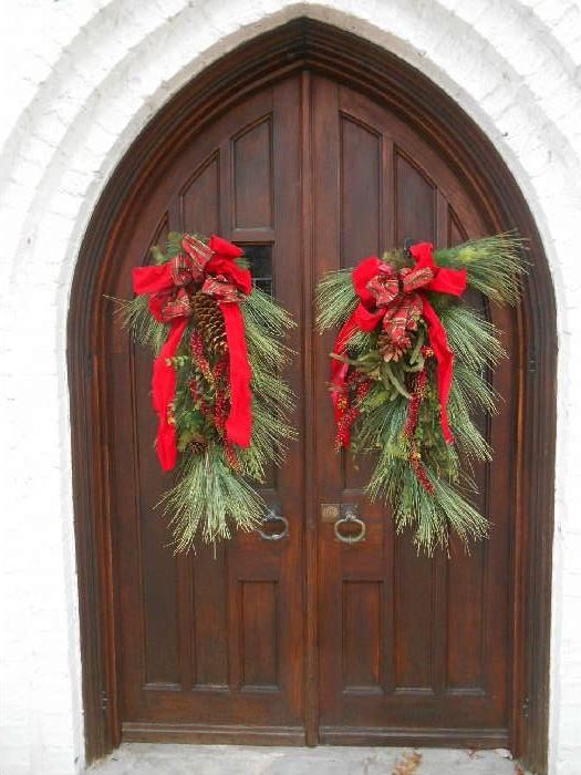 Entrance:  We decorated the front entrance, the foyer/stairs/loft, and the living room for the holidays with the client's decorations.  And, yes, all of the decorations you see will be for sale! (Most of it came from THREE FRENCH HENS.)