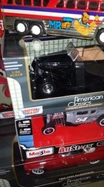 Other boxed cars and toys