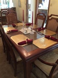 Dining room table with 6 chairs.  Has two additional leaves.