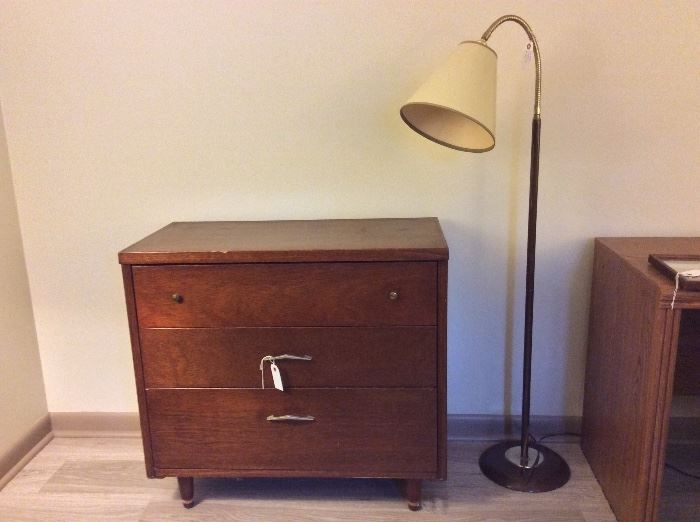 Chest of drawers and floor lamp. 