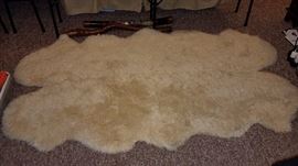 Gorgeous, Authentic, Quad, 4 Pelt Sheepskin rug, rated 5* plus on the back of the pelts, from Napier New Zealand. Gorgeous and comes with two hand dipped pillows that match.
