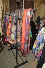 Clothes, purses, scarves, accessories, ladies, women's, coat, hanging rack, rolling rack for sale at end of sale. All of the shelves, tables and benches will be on sale. black and orange tailgate/picnic/camping benches that fold and are 6'. two rolling racks and more! Must see collection of purses from all over. A large selection of name brand,   and kipling