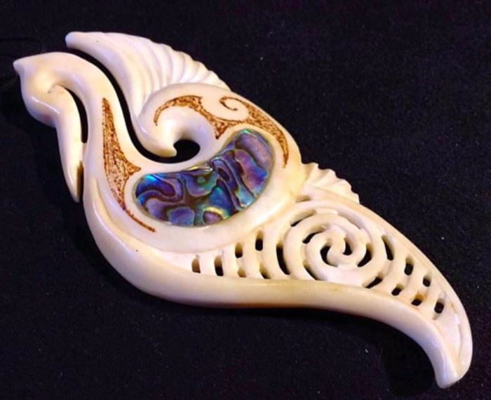 Mother of pearl and bone carved pendant 