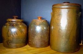 Earthenware lidded canisters jugs