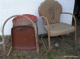 two old metal rockers, need some sand blasting and would be great, original red paint