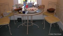 Metal glass top table with chairs