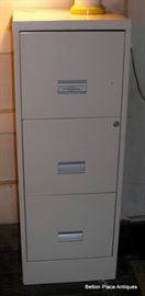 Several metal file cabinets