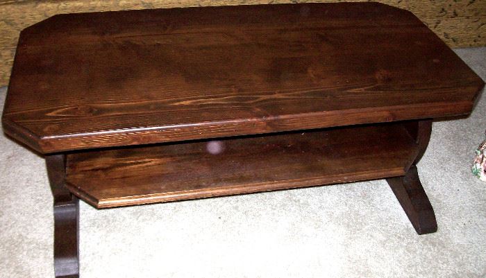 Dark pine coffee table with shelf.  This might be hand made as well