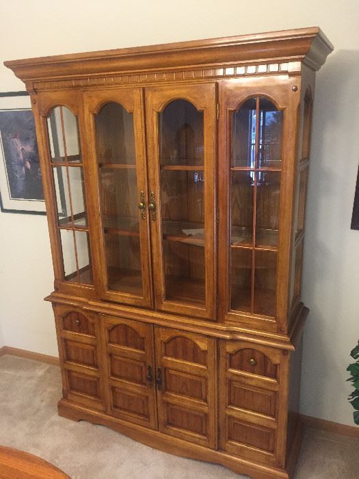 Great condition.  Lighted hutch with storage below. 