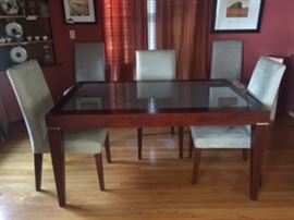 Dining Table stretches to seat 8, hidden leaf