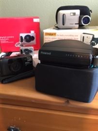 Minolta Dimage 5 Digital Camera, Polaroid Spectra, Nikon 70AF, Digital miniature keychain camera