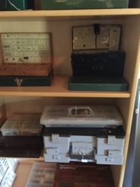 Shelves full of great fishing boxes full of wonderful fishing gear old and new!