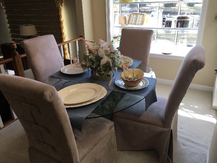 Lovely Glass Top table with four upholstered chairs