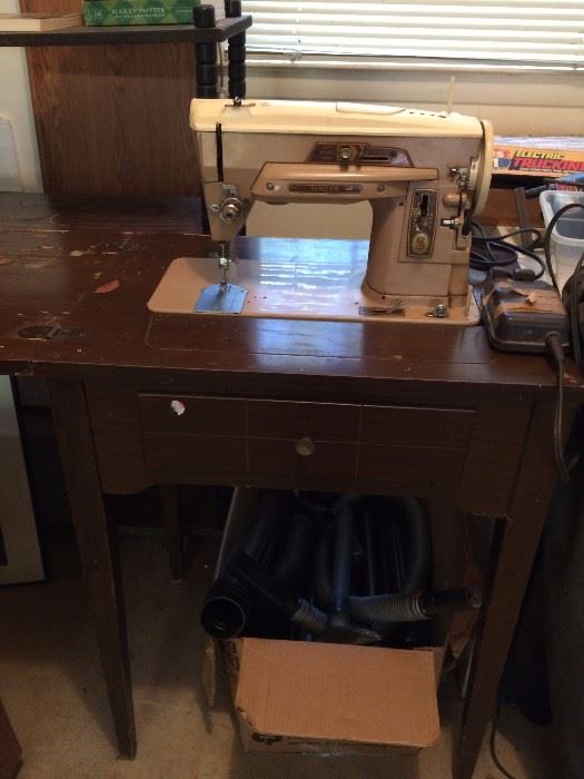 #34 singer sewing machine in case $35 
