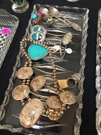 Sterling silver pieces included