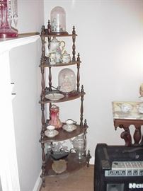 What not shelf; glass domes, hand-painted teaset and other Dresden cups and saucers