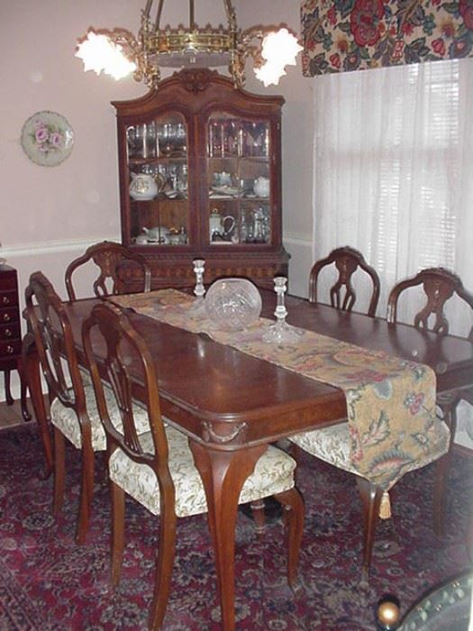 Gorgeous French style mahogany table, six chairs and china cabinet on cabriole legs