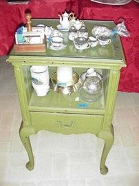 Small glass top table with drawer below