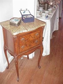 Pair of French marble-top two drawer tables
