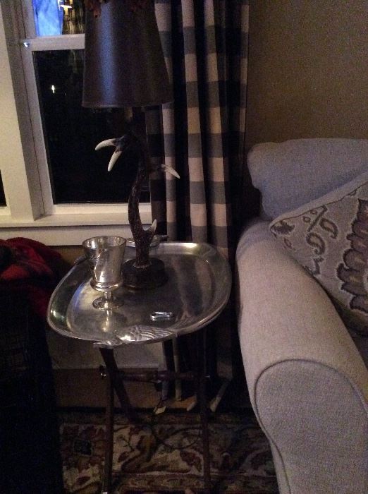 Silver tray table and antler lamp