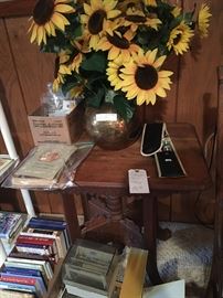 Victorian Parlor Table; Hammered Brass Vase w/Sunflowers; Knitting Needles; & Books