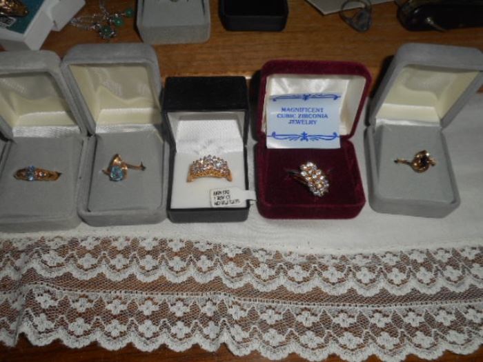 Costume Jewelry including  Cubic zirconia Miracle ring and Anniversary Ring. Rings size 11 