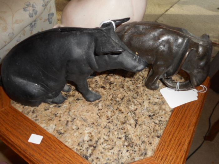 Cast iron pig and elephant 