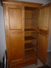 OPENED ARMOIRE