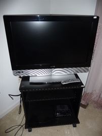 FLATSCREEN TV AND STAND