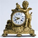 19. FRENCH GILT BRONZE FIGURAL MANTEL CLOCK