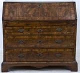 48. GEORGIAN WALNUT AND MAHOGANY BUREAU